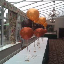 Gold Brown and Orange balloon table display